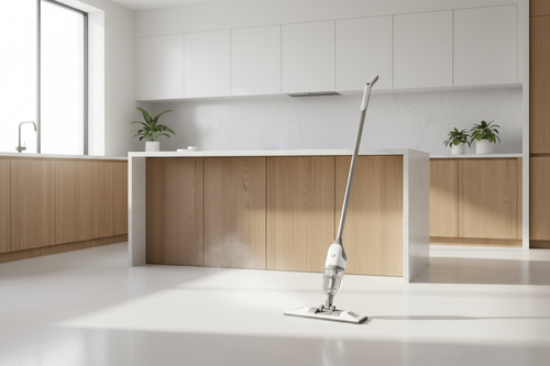 Cordless spray mop on kitchen floor